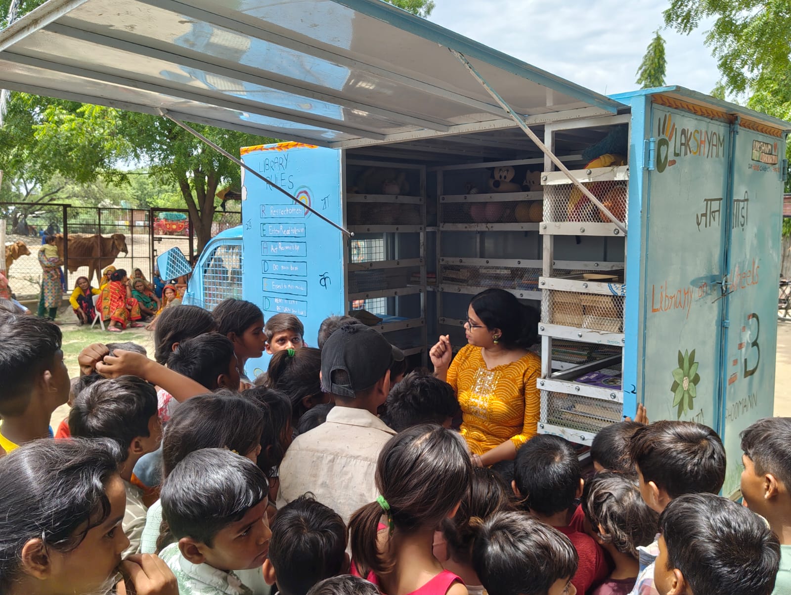 Two children reading a storybook together outdoors